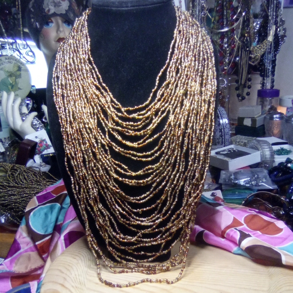 Gold tone Multi-Strand Necklace with Cascading Glass Beads